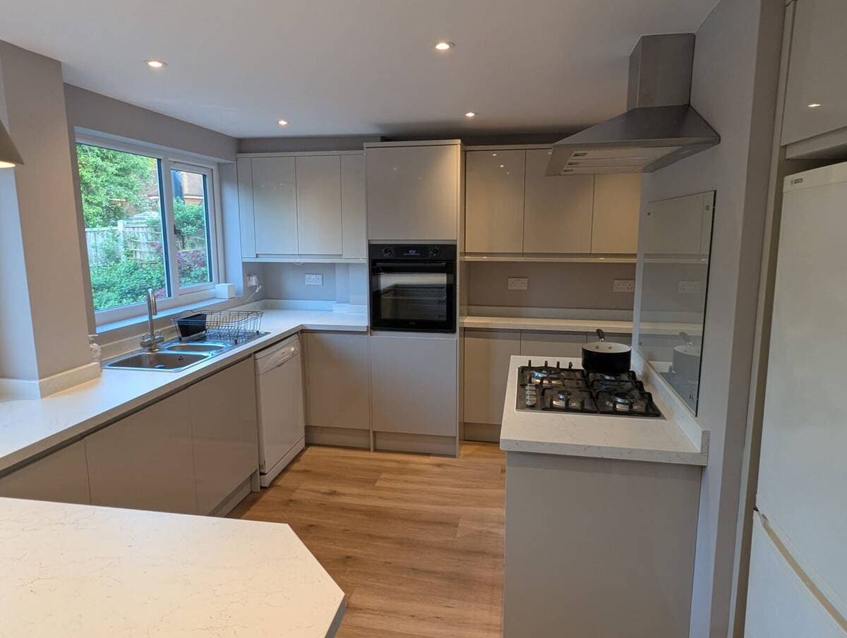 Completed fitted kitchen with sink and plumbing by G R Plumbing in Caterham