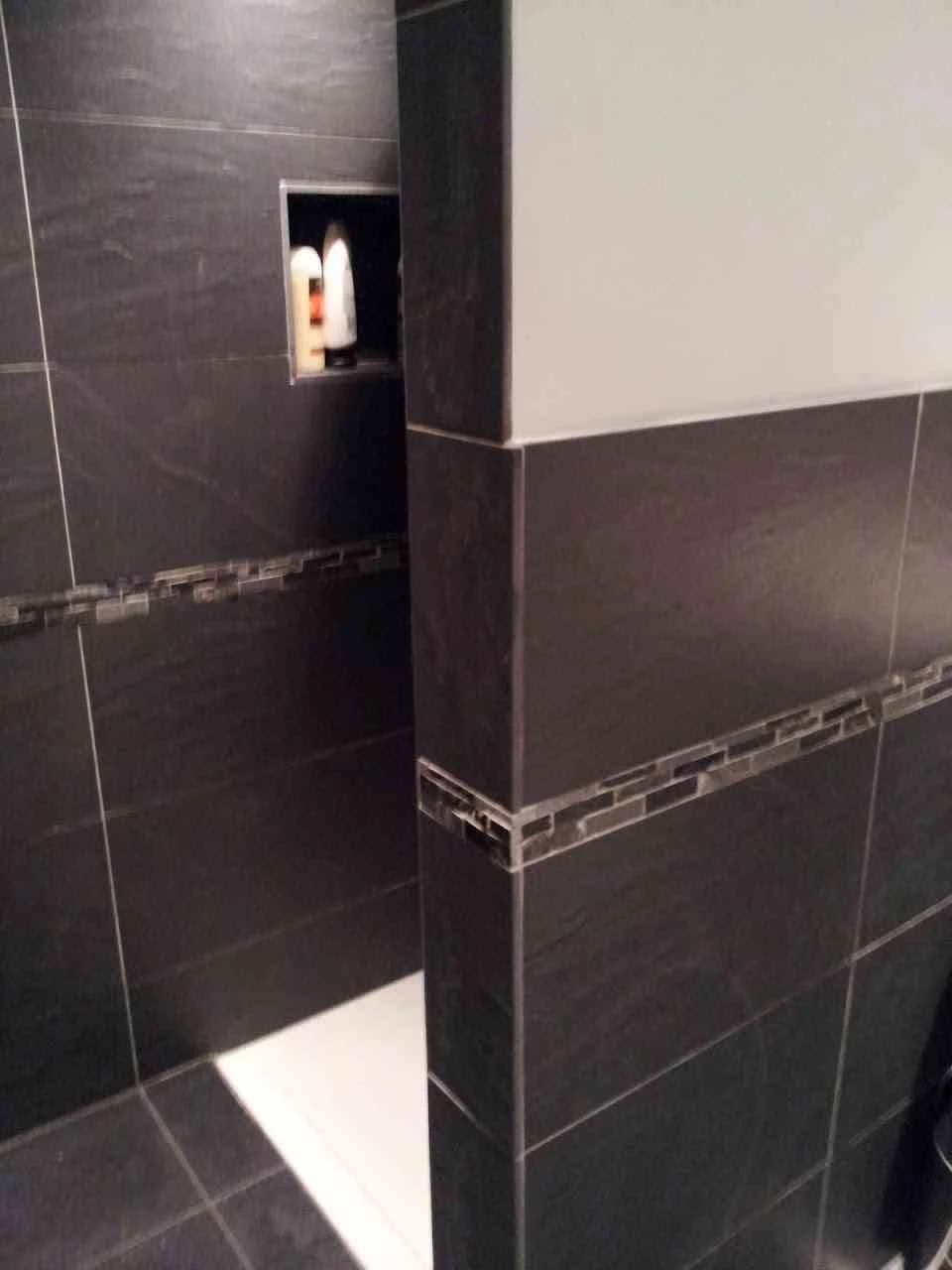 Tiled bathrooms detail from a G R Plumbing installation